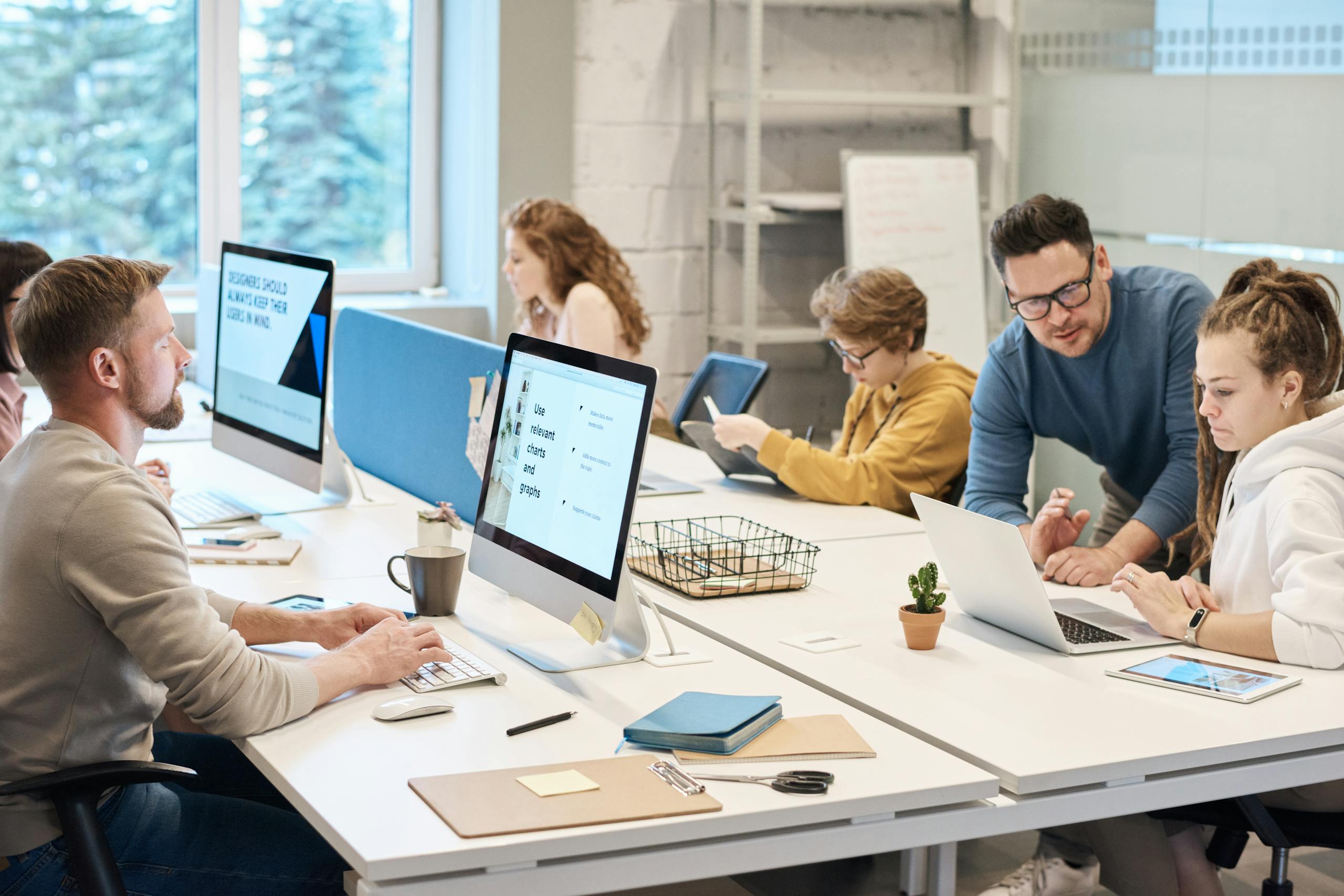 Benefits of people counting Effective space management provides a comfortable team space in a busy office setting with computers and diverse employees working together